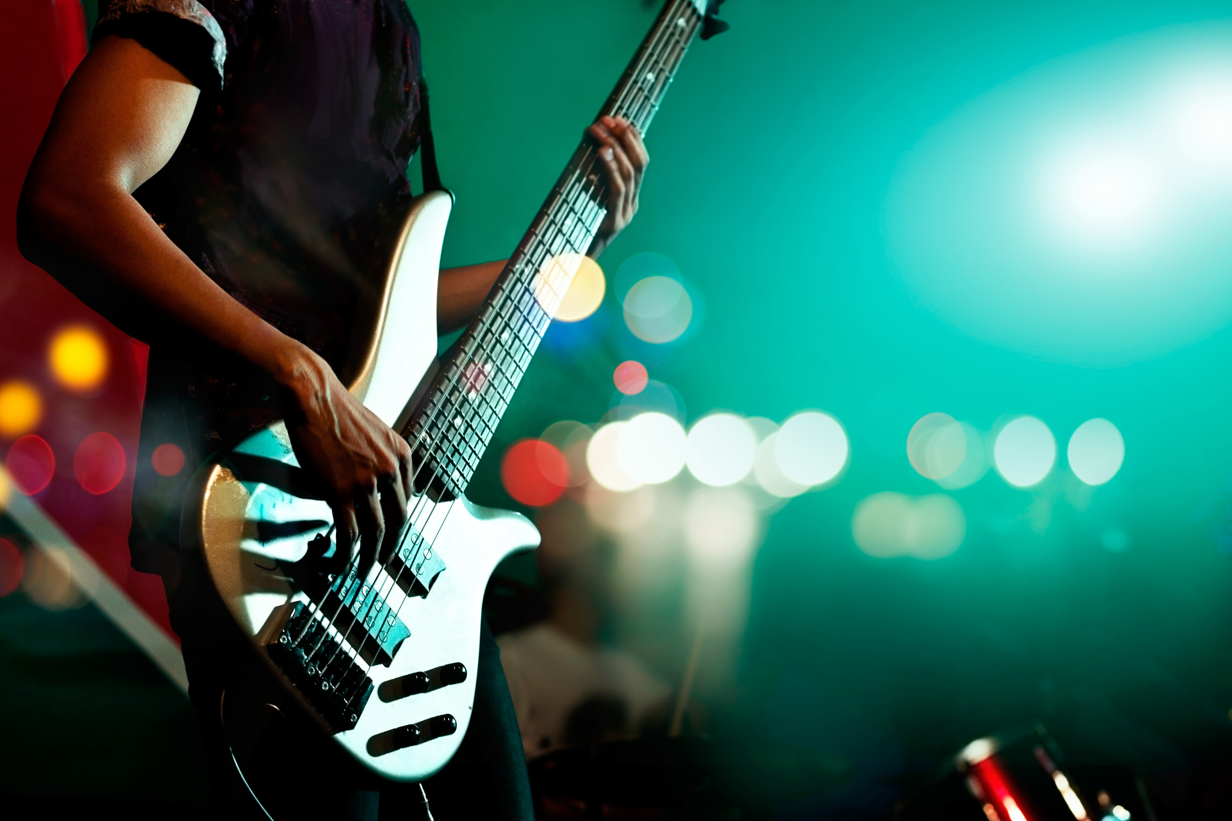 Guitarist on stage during local concert series Pop Nukoonrat 123rf