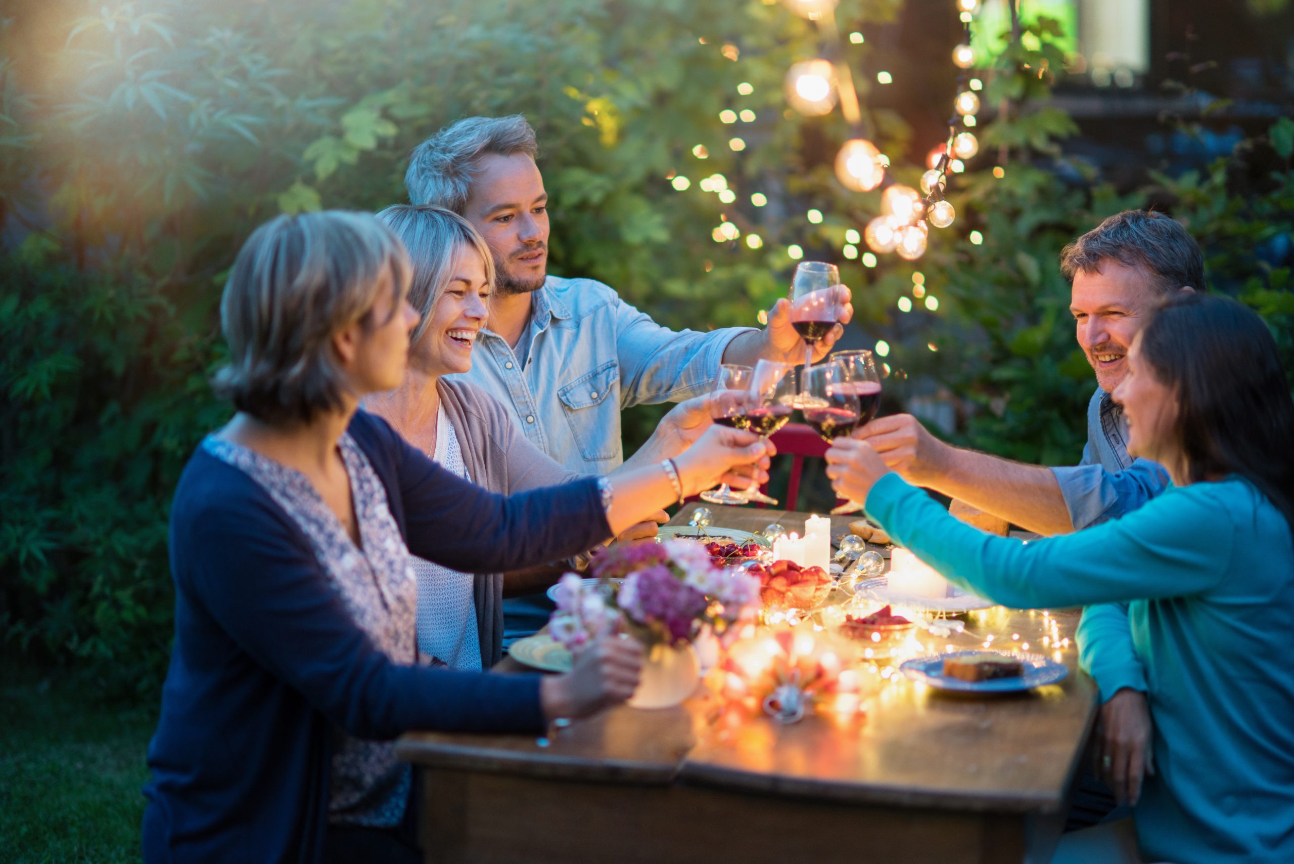 A gathering like those at Traditions of Braselton connected community (c) Adobe Stock