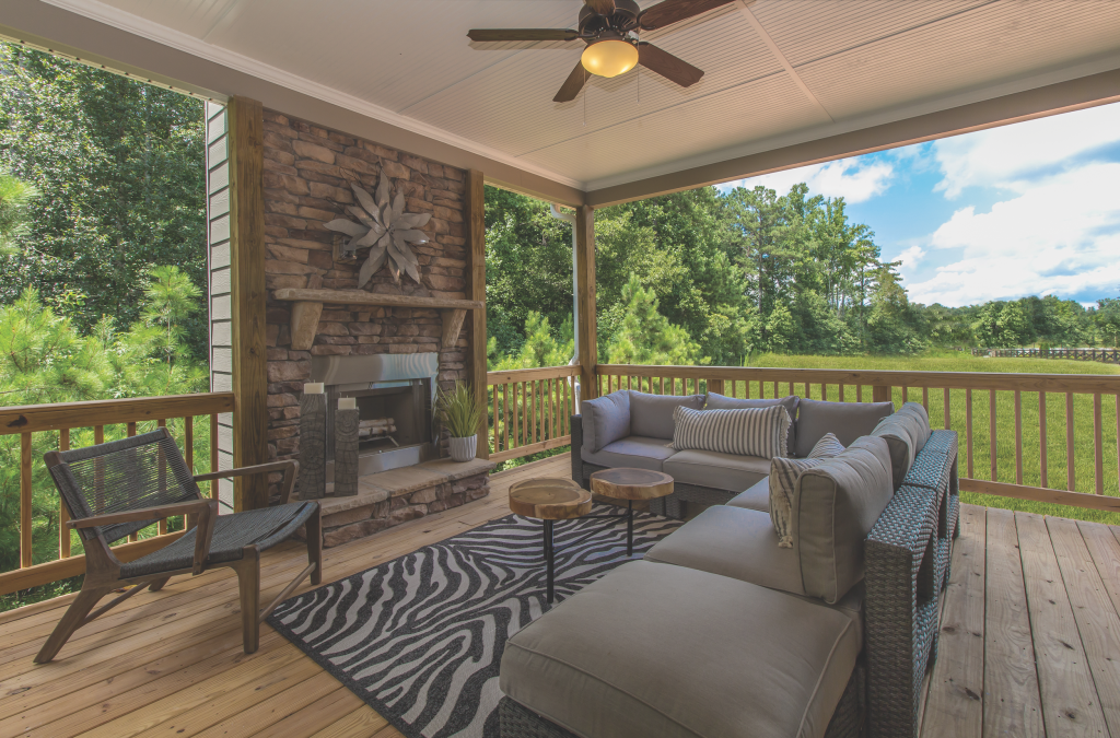 Back porch in Traditions of Braselton with fireplace and beautiful view