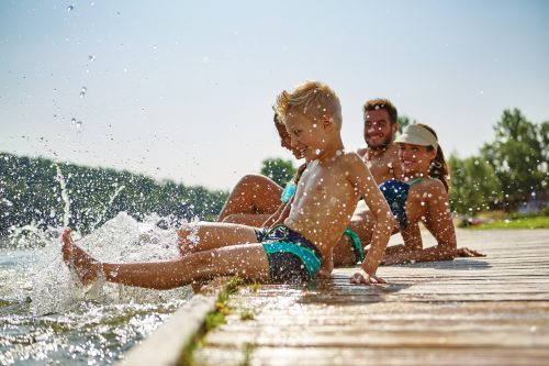 Family having fun and splashing water