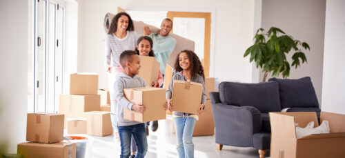 Family moving into Traditions of Braselton new home Monkey Business Images © Shutterstock